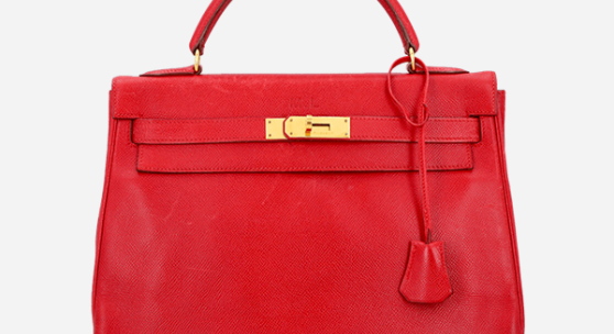 42 HERMÈS VINTAGE Handtasche "KELLY BAG 3...  Koll. 1993. Epsom Leder in Rot mit goldfarbener Hardware. Klassisches Modell mit zwei verschiedenen ...  Startpreis 3.300 EUR