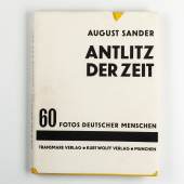 AUGUST SANDER (1876–1964) ‘Antlitz der Zeit’ München, Transmare Verlag / Kurt Wolff Verlag, 1929 Hardcover, yellow cloth bound with original dust jacket and original cardboard slipcase, including publisher's subscription page loosely inserted and small advertising brochure (6 pages, including 3 photos from the book), 22 x 29 cm, 60 pages, foreword by Alfred Döblin. In this study, containing 60 images, Sander captured the multifaceted nature of the German people Schätzpreis 14.000–16.000 Euro © W
