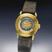 Lot 213 Patek Philippe An Extremely Rare Yellow Gold World Time Wristwatch With Enamel Dial Depicting Eurasia Ref 1415 Mvt 964808 Case 669495 Made In 1949 Est. $600/1.2 million Sold for $ 730,000