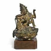 Lot 553 Property of a Missouri Private Collector A Gilt-Bronze Figure of Cintamanicakra Avalokiteshvara Late Tang Dynasty / Five Dynasties Estimate: $60/80,000 Sold for $2,060,000