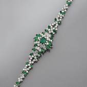 Kat.-Nr. 12 01054 Prunkarmband mit Smaragden und Diamanten, WG 750/000, zus ca. 14.3 ct, L. ca. 17 cm Limit: 23.000,- € 
