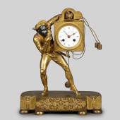 192 Kaminuhr, 19.Jh.  Harlekin mit Uhr, Bronze, vergoldet, 600/ 13000 Euro