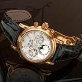  Patek Philippe A Fine Pink Gold Perpetual Calendar Split Seconds Chronograph Wristwatch with Moon-Phases Leap Year and 24 Hour Indication Ref 5004 Mvt 879877 Case 4115668 made in 2004 Estimate 120,000–180,000 USD