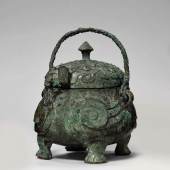 $730,000 (£548,172) A Rare Bronze Double-Owl-Form Ritual Vessel (You), Shang Dynasty
