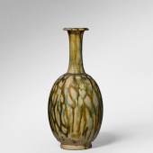 $35,000 (£26,282) $5,000 - 7,000 Sancai-Glazed Pottery Bottle Vase, Tang Dynasty