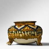 $35,000 (£26,282) $15,000 - 20,000 Sancai And Blue-Glazed Pottery Tripod Jar, Tang Dynasty