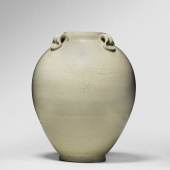 $93,750 (£70,399) $8,000 - 12,000 A White-Glazed Jar, Tang Dynasty