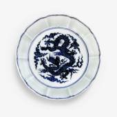 Property from an Important Private CollectionA Superbly Painted Rare Blue and White Dragon Brush Washer Xuande Mark and Period Diameter 8 1/8 in., 20.7 cm. Est. $1.5/2.5 million Sold for $ 1,692,500