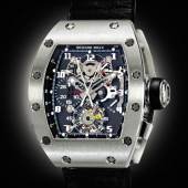 Lot 240 A Collection of Modern Complicated Wristwatches from an American Collector  Richard Mille An Impressive Platinum Tonneau Form Tourbillon Split Seconds Chronograph Wristwatch With Power Reserve And Torque Indication Mvt 13 Rm008 Ag Pt No 24 Circa 2006 Estimate $250/500,000 Sold for $423,000