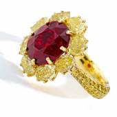 Lot 89 Property From An Important American Collection A Superb Ruby and Colored Diamond Ring Centering an oval-shaped ruby weighing 8.11 carats, framed by oval-shaped diamonds of yellow hue, the band further pavé-set with round diamonds of yellow hue Estimate $2.5/ 3.5 million