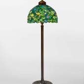 Lot 305 Property from an Important American Collection Tiffany Studios An Important "Snowball" Floor Lamp with a "Scroll" Senior floor base and "Pig Tail" finial shade inscribed twice with Walter P. Chrysler, Jr., accession number GAT 82.53 base impressed Tiffany Studios/NEW YORK/375 leaded glass, patinated bronze 78 in. (198.1 cm) high 24 3/4 in. (62.9 cm) diameter of shade circa 1905-1910 Estimate $500/700,000