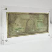 Agustina Woodgate, K13277993D, 2021. 12 cm x 22 cm x 1.5 cm, Hand-sanded $1 US banknote in acrylic case. Courtesy of the artist and Barro