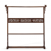 Property from an Important American Private CollectionAN EXTREMELY RARE AND MAGNIFICENT HUANGHUALICLOTHES RACK17TH CENTURY72 in. (182.9 cm.) high, 69.1/8 in. (175.6 cm.) wide, 17 in. (43.2 cm.) deepEstimate: $400,000-600,000