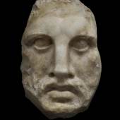 ARIADNE GALLERIES, Hellenistic Egypt  Face of Serapis, circa first century BC  Marble  19 cm H