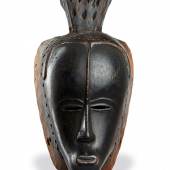Lot  97 Important Guro Mask Ivory Coast H: 38 cm (1’ 3”)  Estimated age: 19th century, Estimate: € 45.000 - 55.000