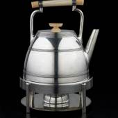 Exhibitor: H. Blairman & Sons Ltd  Elkington Spirit kettle Designed and manufactured by Elkington.  1885