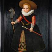 Dutch School, A portrait of a young boy, full-length, wearing a green hat and a white frill collar and holding a baton and a hobby horse, circa 1630, Est. £8,000 – 12,000