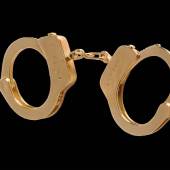 Sylvie FLEURY  Gucci Handcuffs, 2001-02  Goldplated metal, Ed. 11/25  23 x 9 cm  Galerie Thaddaeus Ropac