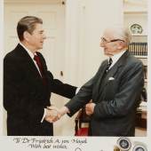 Hayek, F., Photograph of Hayek meeting Reagan, signed by Reagan (£1,500-2,00)