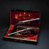 Ein Paar Perkussionspistolen mit Goldeinlagen im Kasten, Lebeda, Prag um 1850. SP: 9000 Euro