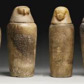Lot 102 A Set of Four Egyptian Alabaster Canopic Jars, 26th Dynasty, 664-525 B.C.