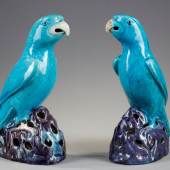 Galerie Bertrand de Lavergne  Pair of turquoise and aubergine enamelled Chinese biscuit parrots placed on pierced rocks China, Kangxi period (1662-1722) H 21 cm Similar items with a gilt bronze base that belonged to Queen Marie-Antoinette are kept at the Louvre Museum (Département des Objets d’Art).