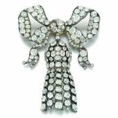 Lot 307 THE DIAMOND BOW BROOCH mid 19th century diamonds, silver, gold designed as a bow suspending an articulated tassel, set with circular-cut and cushion-shaped diamonds. Estimate £25,000-35,000