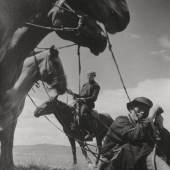 Hensky, Herbert Mongolian horse breeders. 1960s. Vintage large-format gelatin silver print. 48,9 x 38,8 cm. Photographer's/agency stamp and annotated in crayon/ballpoint pen on the verso.