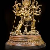 Property from a Private Berlin Collector,  A Monumental Gilt-Copper Group of Charkasamvara And Vajravarahi,  Nepal, 16th/17th century,   Estimate: 100,000–150,000 USD