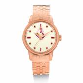 Lot 22 - Patek Philippe - Reference 2481, made in 1957 -A pink gold and ruby-set wristwatch with enamel dial featuring a portrait of King lbn Saud Est. $45,000-65,000