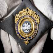 Great Britain, The Most Noble Order of the Garter, a magnificent Lesser George Sash Badge, with central agate cameo of St George and the Dragon by Benedetto Pistrucci set in a fine 22 carat gold and blue enamel mount by William Clutton, with engraved presentation inscription on the reverse Estimate £100,000-150,000