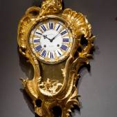 Exhibitor: Richard Redding Antiques Ltd  Julien Le Roy (1686-1759) Louis XV cartel clock Case almost certainly made by Jacques Caffiéri  Gilt bronze, height 95 cm  Signed on the central white enamel dial plaque Julien Le Roy and similarly on the movement, the case stamped with a C-couronné poinçon.  Paris, 1745-49