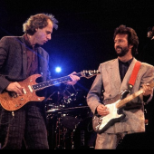 1985 when Dire Straits performed ‘Money For Nothing’ 