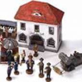 Spielzeugdorf mit Ge- bäuden, Fahrzeugen und Figuren (233 Teile). Holz, gedrechselt und
geschnitzt,farbig ge- faßt. Höhe zwischen
1,5 und 20 cm.
