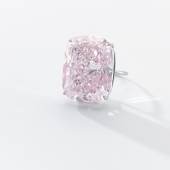 Lot 356 Superb fancy light pink diamond ring Harry Winston, circa 1970 Set with a step-cut fancy light pink diamond weighing 33.63 carats, between tapered baguette diamond shoulders, size 51, signed Winston.  Estimate: CHF 7,900,000 – 13,700,000 Lot Sold: CHF 12,647,000