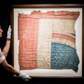 PROPERTY FROM A PRINCELY COLLECTION Battle of Trafalgar--HMS Victory, 'The Victory Jack' AN EXCEPTIONALLY LARGE FRAGMENT OF THE UNION FLAG, BELIEVED TO HAVE FLOWN FROM HMS VICTORY AT THE BATTLE OF TRAFALGAR Estimate   80,000 — 100,000  