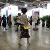 Visitors browse artworks at Art SG. Photo: Enid Tsui