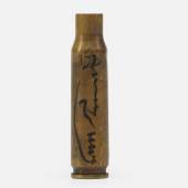 A brass bullet signed by Andy Warhol. Photo: Courtesy of Schubertiade